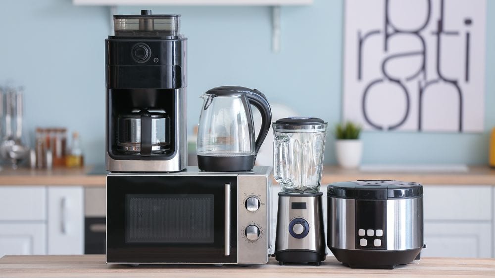 Kitchen appliances stacked on a counter