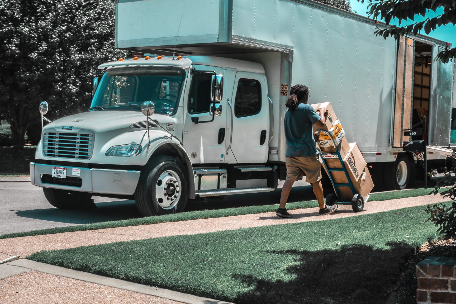 Image of a Move On mover transporting items to a moving truck
