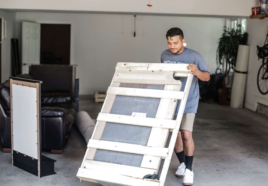 Move On mover hauling out an item from a Nashville homeowner's garage