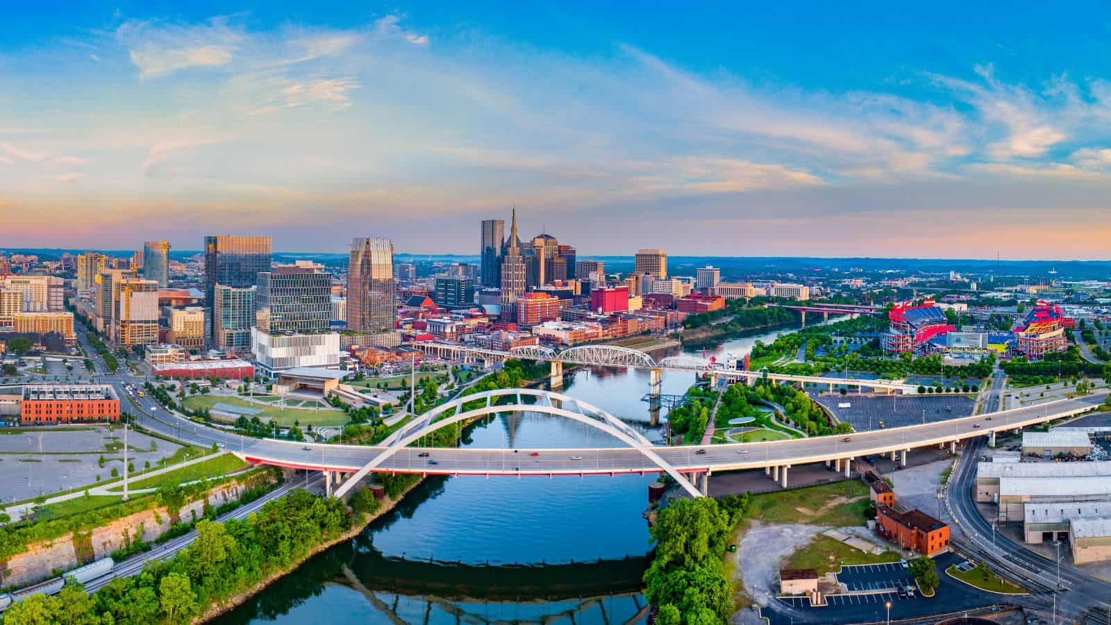 Nashville city skyline from a drone showing the river