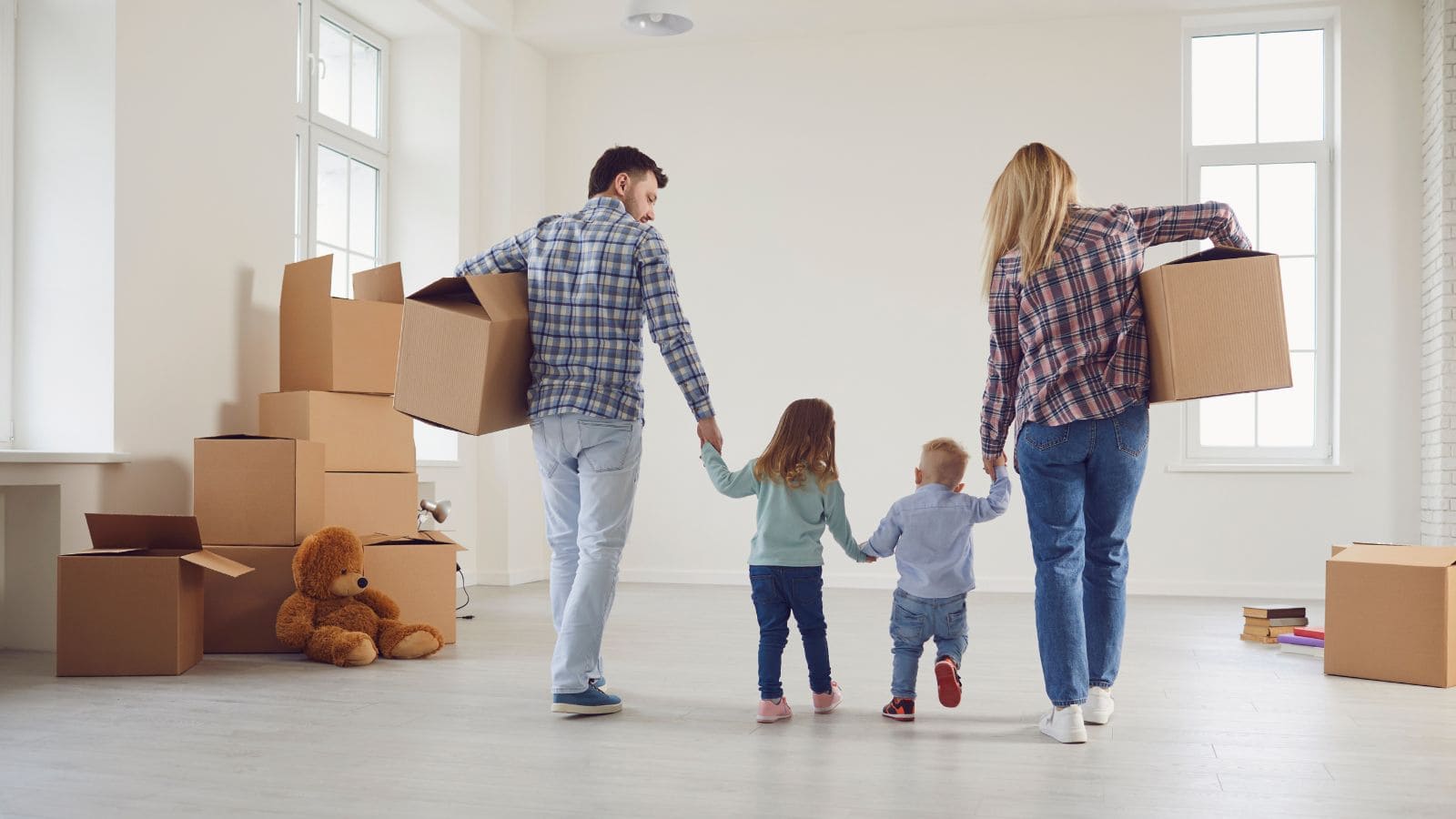 Family moving with boxes